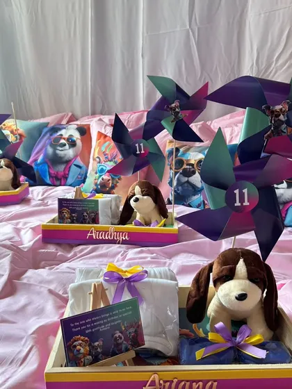 We love creating cozy and fun sleepover parties. This setup included a beautiful tent with fairy lights, custom cushions, a snack bar, and personalized gift hampers for each guest.