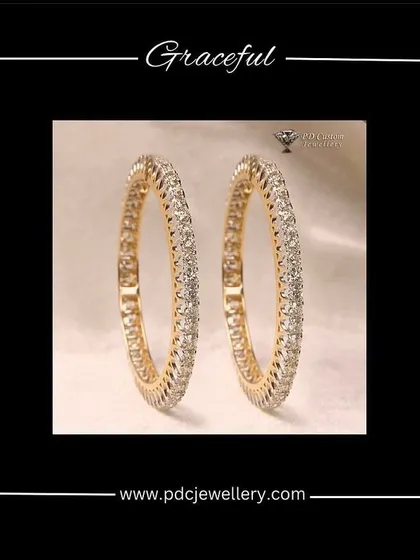 Graceful 20-pointer single-line diamond bangles. These are a step up in size and sparkle, perfect for someone who wants a classic design with a bit more presence.