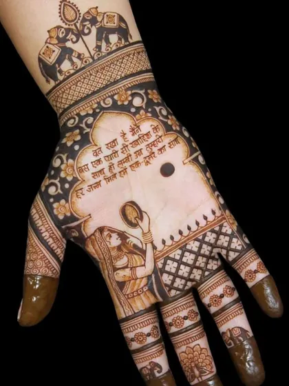 This Karwa Chauth design features a woman with the prayer thali and a beautiful Hindi verse about love and devotion. The elephant motifs on the wrist add a touch of traditional grandeur.