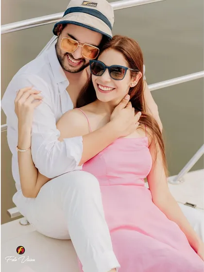 A happy, relaxed portrait of the couple enjoying their time on the yacht. We aim to make our pre wedding shoots feel like a fun date, capturing genuine smiles and laughter.
