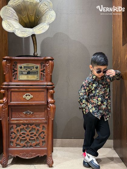 It's all in the attitude. Here, the star-embellished blazer is styled down with a floral shirt, showing its versatility for a cool, edgy look.