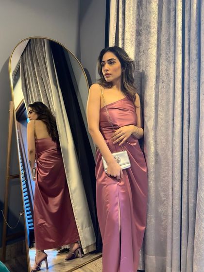 Another angle of the pink dress, this time with a different clutch. Changing your bag is an easy way to switch up your look.