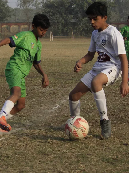 An intense one on one duel from a Delhi Youth League match. Our players are trained to be confident and skilled on the ball under pressure.