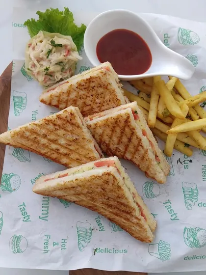 A simple classic done right. Our grilled club sandwiches are cut into quarters and served with french fries and coleslaw, making for a satisfying and familiar option for casual events or kids' parties.