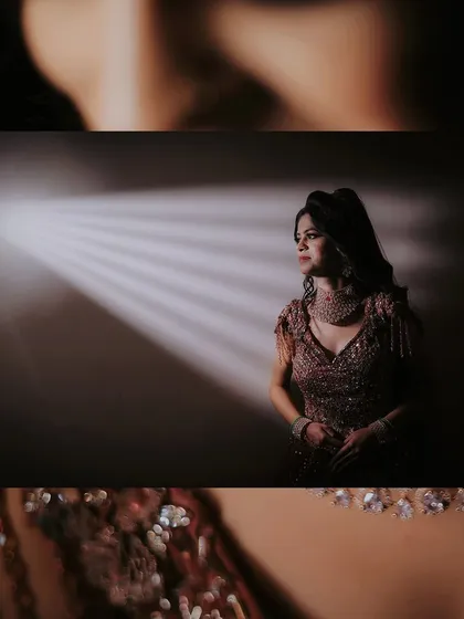 An artistic portrait of the bride using a spotlight effect. This creative lighting technique adds a touch of glamour and drama.