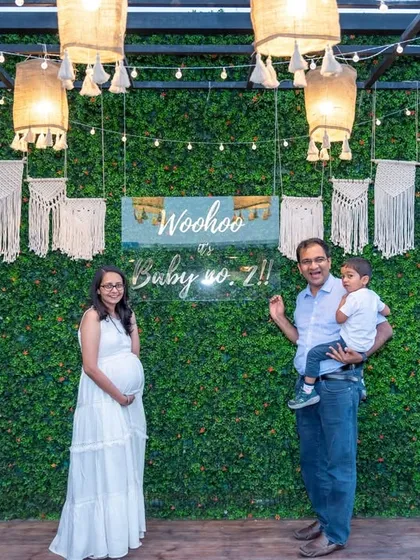 A happy family portrait at a chic, modern baby shower. We capture the excitement of parents-to-be and their loved ones as they celebrate the upcoming arrival.