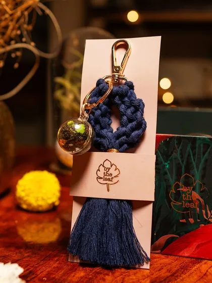 This handcrafted macrame keychain with a tiny terrarium orb is a unique part of my gift collection. It’s a small, portable piece of nature that you can carry with you.