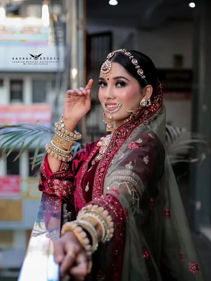 A playful shot where the bride reaches towards the camera, creating an engaging and interactive feel.