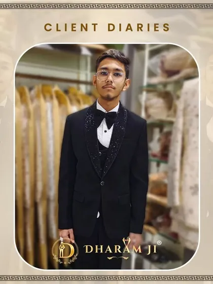 A young client looking dapper in his first three-piece tuxedo. The sparkling lapels add a fun, celebratory touch.