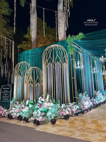 The entrance at night, with dramatic lighting creating a magical and inviting atmosphere.