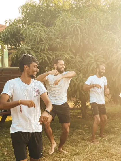 Spontaneous moments of dance and laughter in the sun are a common sight here. Life at the ashram is about finding freedom and joy in movement, both on and off the mat.