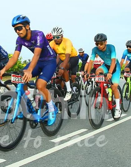 The amateur peloton is a hive of activity, with riders constantly moving and adjusting their position within the group.