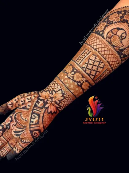 A full arm bridal design that showcases a variety of foundational techniques, including checks, dots, floral bands, and peacock motifs.