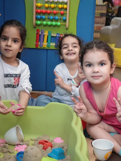 Our sensory sand pit is a calm and creative corner for our youngest visitors. Here, toddlers can engage in tactile play, which is crucial for their early childhood development, all while making new friends.