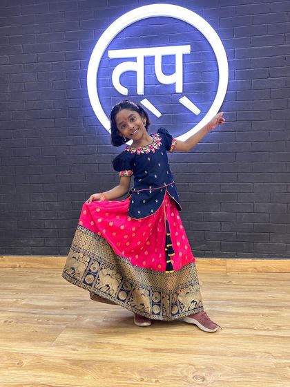 A beautiful portrait of one of my students in a traditional outfit, ready for a festive performance at the studio.