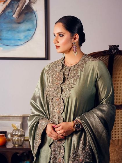 The iconic Sania Mirza in a timeless mint embroidered tunic by Jayanti Reddy. This piece showcases elegance, sophistication, and celebrity-approved style.
