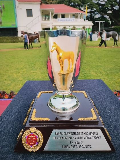 The V. Venugopal Naidu Memorial Trophy, featuring a golden horse figurine.