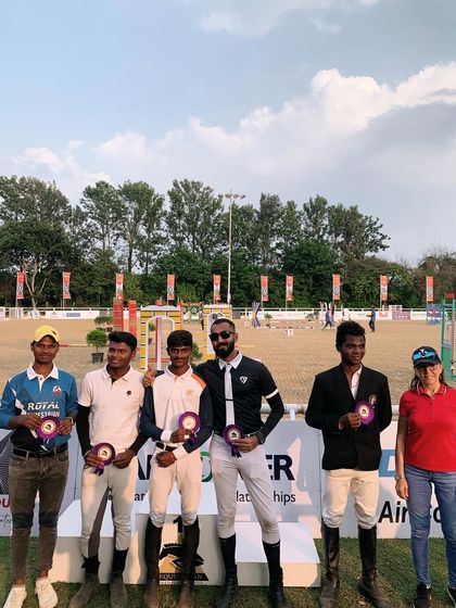 Team Royal standing proud after a successful day at the Embassy International Riding School. Our new team is starting strong, and we're excited for what the future holds.