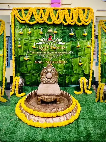 The centerpiece of a puberty ceremony is the seating for the guest of honor. We created this traditional setup with a banana leaf and marigold backdrop, complete with an ornate throne, to make her feel like royalty on her special day.