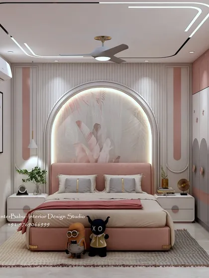 I believe a child's room should be a magical space for them to grow and dream. For this bedroom, I designed a custom arched headboard with a soft, backlit mural, creating a whimsical focal point. The combination of pastel pink, clean white, and functional storage makes the room playful yet practical.