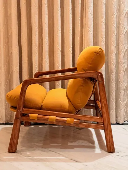 Meet our "Marshmallow" Armchair, designed for ultimate comfort. Crafted from warm Ashwood with plush, oversized cushions in a textured suede fabric, this piece is as cozy as it is stylish, perfect for any modern living room or reading nook.