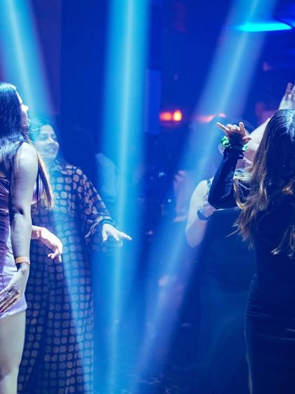 Dancers under the blue spotlights during the grand launch of Hydra. The club was buzzing with energy from the moment the doors opened.