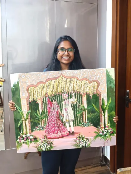 Here I am, happy to present the finished live wedding painting to the couple at ITC Maurya.