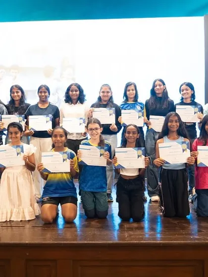 The talented girls from our Bravo Xcelerate teams pose with their certificates at our annual awards day. This photo celebrates the achievements and bright future of our female players across all age groups.