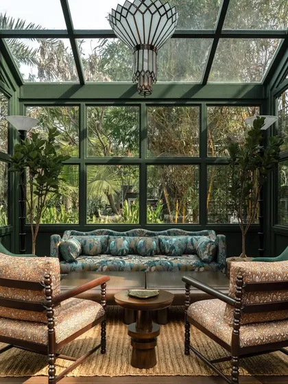 The Lord Elgin Glasshouse in Amritsar is an oasis of lush greenery and opulent comfort. I designed this space to feel like an escape, where the interplay of light through the glass structure and the rich textures of the furniture create a transportive atmosphere.