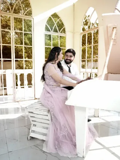 A romantic and elegant shoot with a white piano in a beautiful, sunlit conservatory. This theme is perfect for couples who love classic romance.
