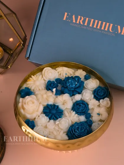 A stunning blue and white floral urli, reminiscent of fine porcelain. It's a truly elegant and unique piece.