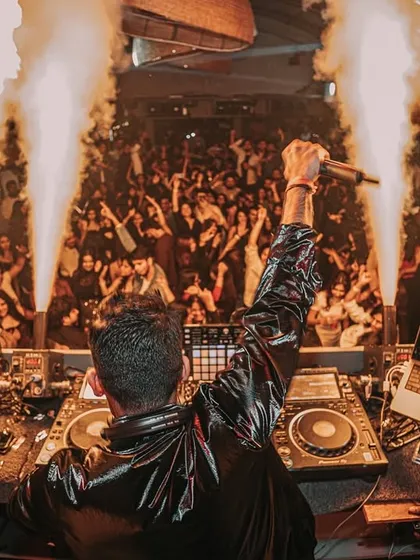 Bringing the heat at De'orra in Chandigarh. This shot captures the moment the pyro jets went off, lighting up the entire club and the faces in the crowd.