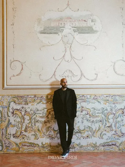 A quiet moment captured against the stunning, traditional Portuguese tilework during a destination wedding in Lisbon. It's these beautiful details that make each wedding unique.