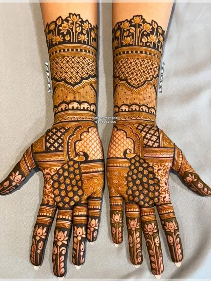 This design was for the bride's sister, showing how full and intricate patterns with peacocks and lotuses can be perfect for the whole bridal party.
