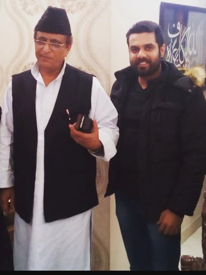 An older photograph from a meeting with Mr. Azam Khan. Long-standing relationships are a cornerstone of my practice.