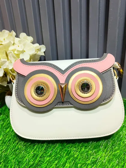 A fun and quirky owl-themed clutch. I also stock unique and playful pieces for those who want their accessories to be a conversation starter.