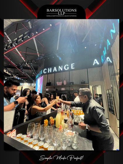A toast to a successful launch. Guests enjoying the drinks and atmosphere at the Armani Exchange store opening.