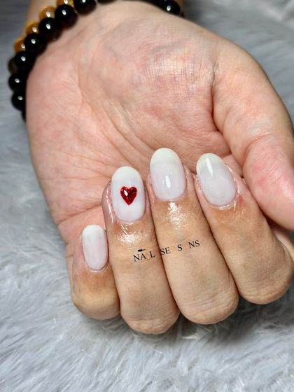 This minimalist design is perfect for someone who loves a clean look with a little touch of love.