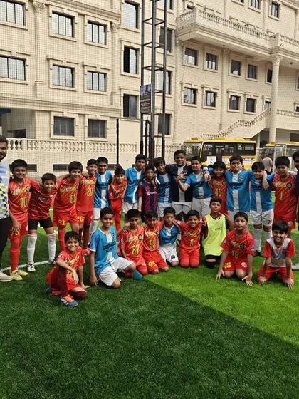 Our U9 and U11 squads after a friendly match, all smiles after a great day on the field.
