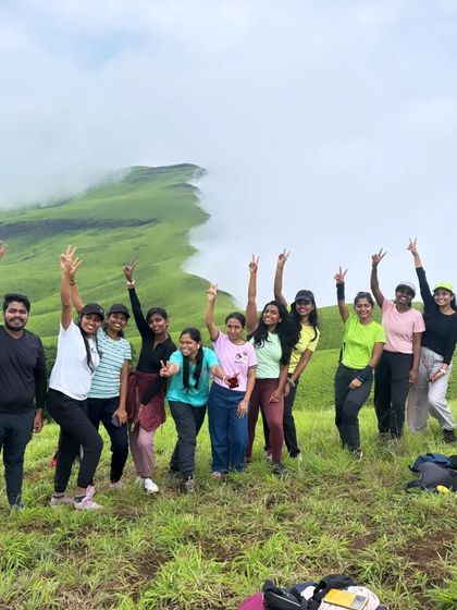 Victory poses from our Nethravathi batch. The shared experience of reaching the summit creates strong bonds.