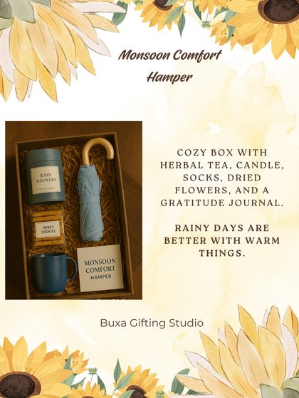 Another take on the "Monsoon Comfort Hamper," this one includes a mini umbrella, a gratitude journal, and herbal tea.