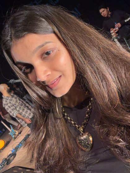 A selfie from the stage, capturing the excitement and the view of my band setting up behind me.