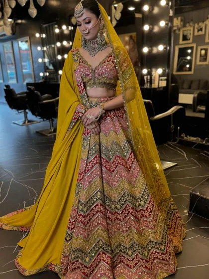 Another angle of the multi-colored lehenga, showing how the different colors and patterns come together to create a festive and joyful look.