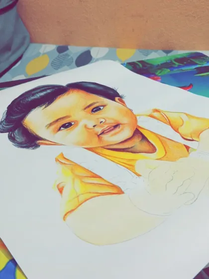 A work-in-progress shot of the baby's portrait. You can see how I start by laying down the base skin tones before adding details and shadows.