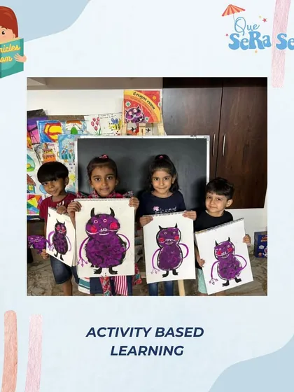 Activity-based learning in action. Here, children are showing off the monster characters they created after a storytelling session, connecting art with literature.