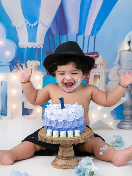 Let the fun begin! A first birthday cake smash is a celebration of pure, uninhibited joy. I love capturing the delightful mess and the priceless expressions as they explore their first taste of cake.