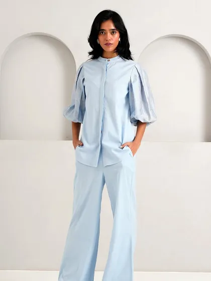 A light blue co-ord set with puff sleeves from the Socotra Ornamental collection, offering a chic and modern take on festive wear.