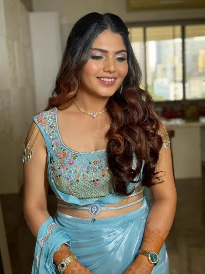 A final look at this beautiful half-up, half-down hairstyle. It is a timeless choice for engagements, receptions, or any celebratory occasion.