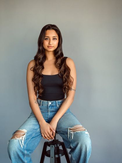 A simple, modern headshot. While I am deeply rooted in the tradition of Kathak, my approach to dance and life is also contemporary and always evolving.