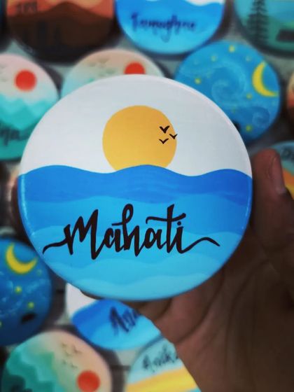 A close-up of a personalized magnet with a "Mahati" and a sunny ocean scene. These make for wonderful, personal keepsakes.